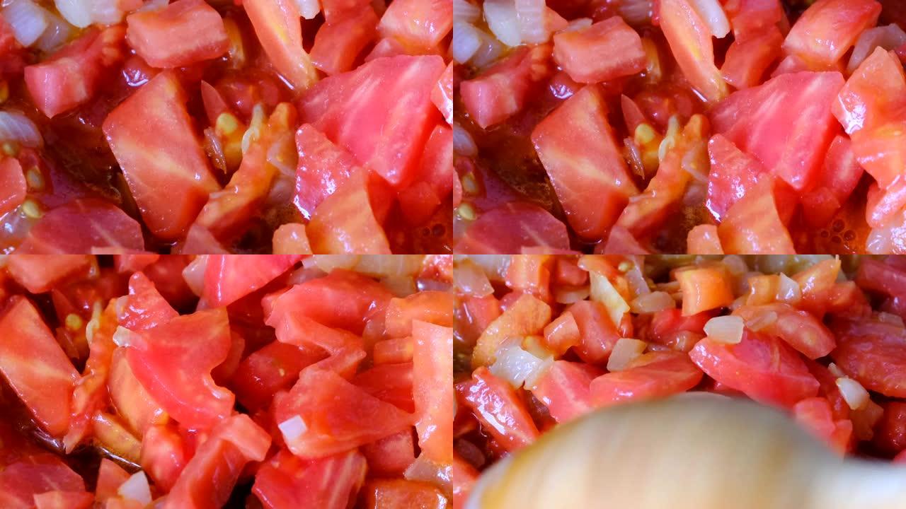 用红色新鲜西红柿切碎的白洋葱