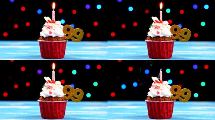美味的生日蛋糕，蜡烛燃烧，彩色模糊灯光背景上有99号