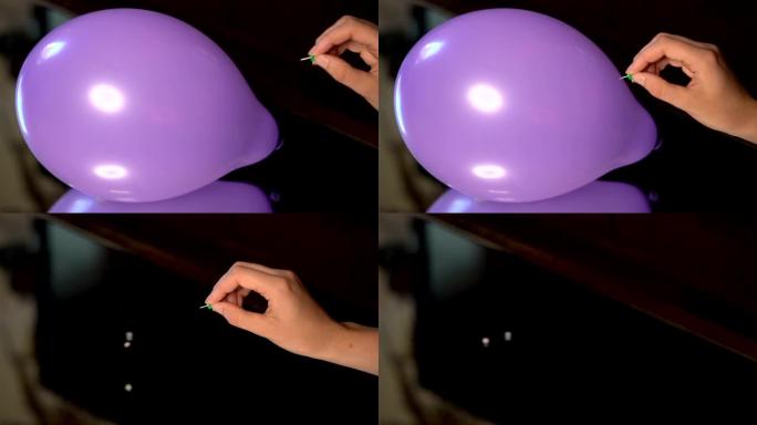 手弹出紫色气球与拇指大头钉慢动作