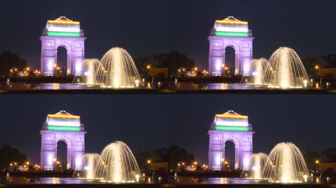 一个喷泉和印度门在晚上在新德里，印度的特写