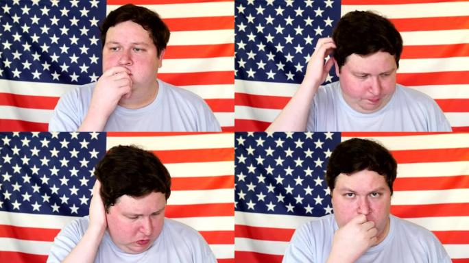 一个年轻人在想一些关于美国国旗背景的事情