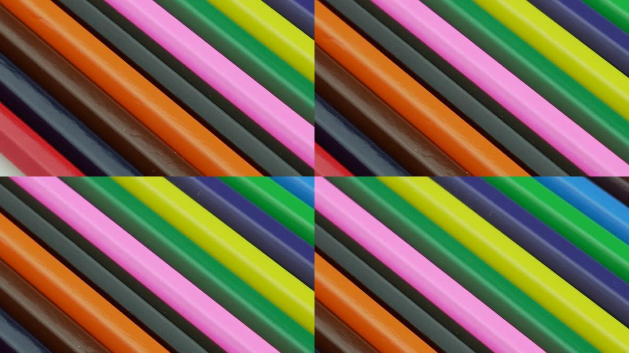 彩色铅笔背景。彩色木制铅笔运动