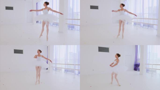 穿着白色芭蕾舞短裙和poines的芭蕾舞女演员在芭蕾舞课上跳舞。