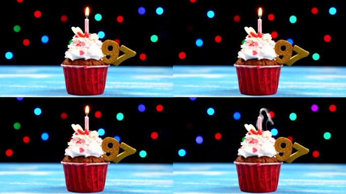 美味的生日蛋糕，蜡烛燃烧，彩色模糊灯光背景上有97号