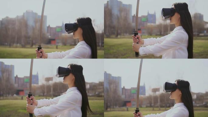 中国女孩用虚拟现实眼镜看剑。风吹在头发上。