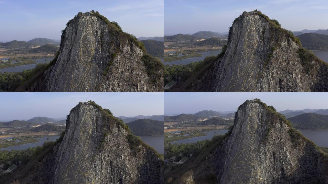 泰国芭堤雅-2019年5月18日: 画在悬崖上的大金佛。巨大的图纸。鸟瞰图。