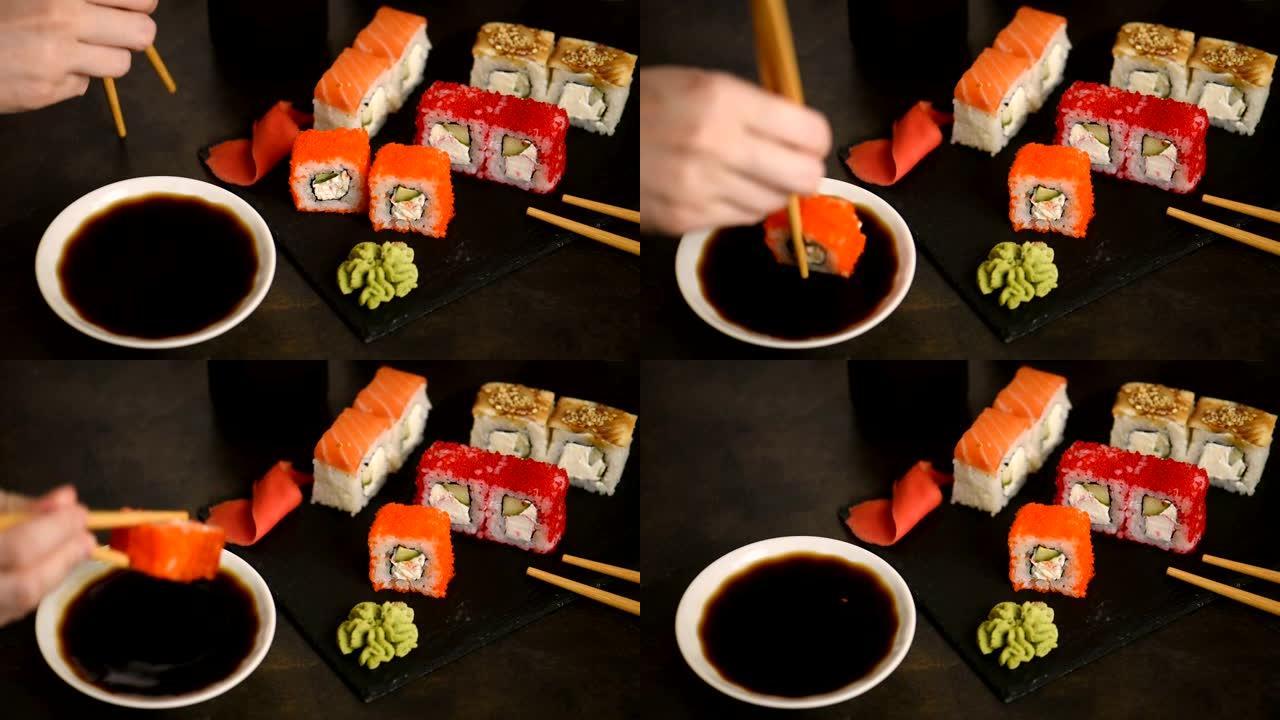 用筷子拿寿司。