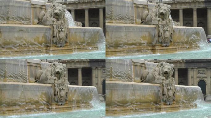 狮子雕塑和喷泉的景色