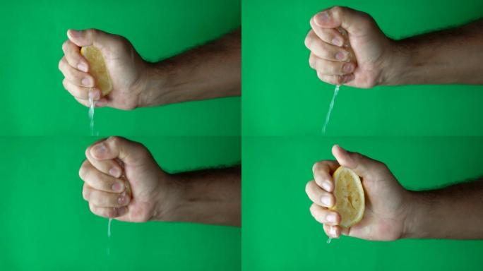 手在绿色屏幕上挤压柠檬慢动作