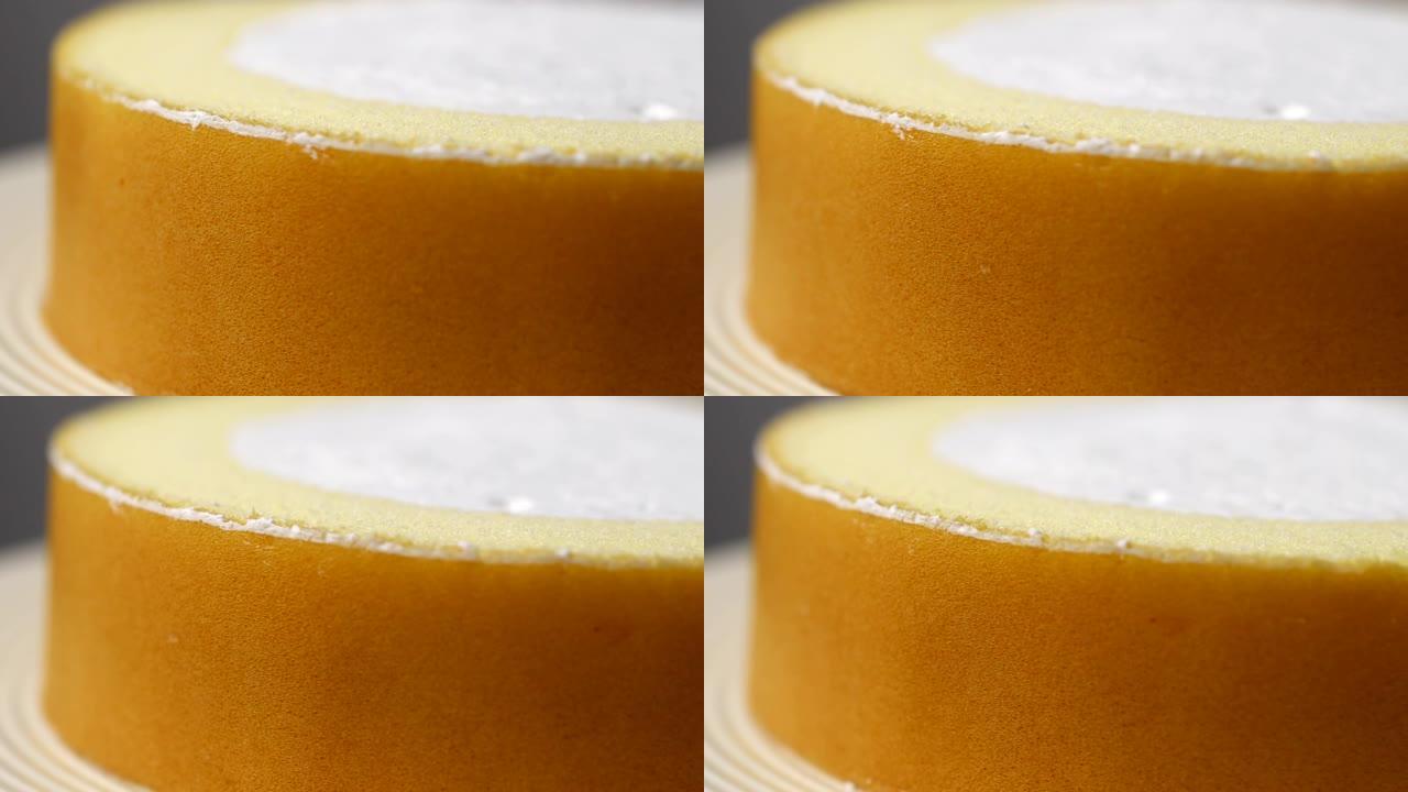 香草搅打奶油蛋糕卷，以4k分辨率特写旋转