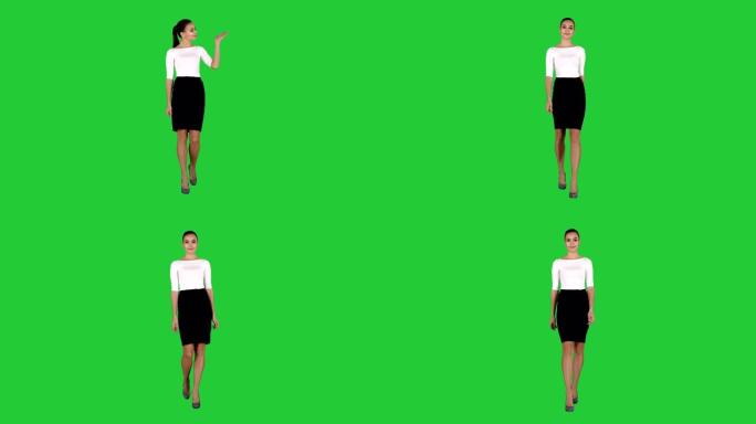 女人在绿屏上展示和展示商务服装的复印空间，色键