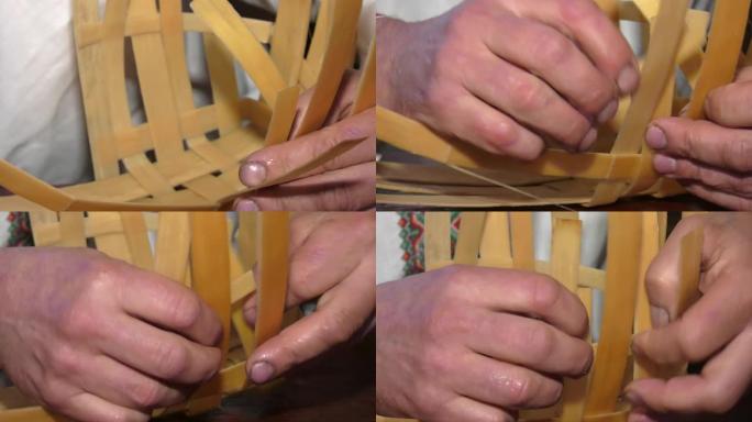 用自己的双手用松木贴面编织篮子。用松木瓦编织的古老篮子