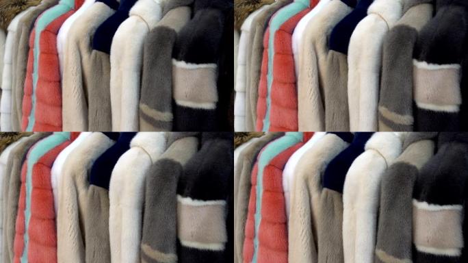 毛皮大衣一排挂在衣架上。