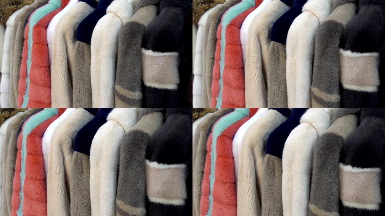 毛皮大衣一排挂在衣架上。