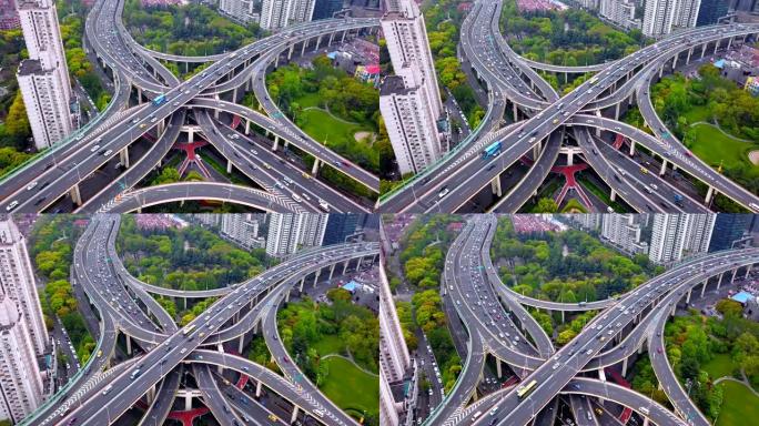 高速公路交叉口形状字母x十字的鸟瞰图。交通概念中的桥梁、道路或有树的街道。中国上海市城市建筑结构形状