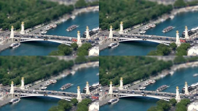 阳光明媚的日子，从巴黎著名的埃菲尔铁塔鸟瞰图，塞纳河和亚历山大三世大桥交通