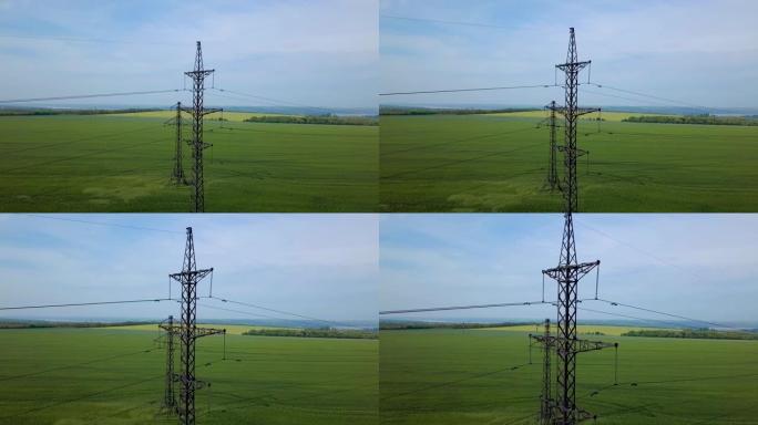 绿地上的高压电力塔