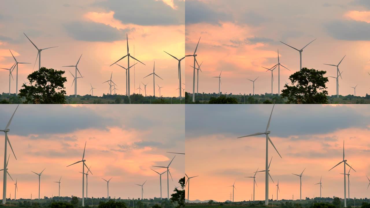 日落时风力发电机的场景，可再生能源工厂的概念