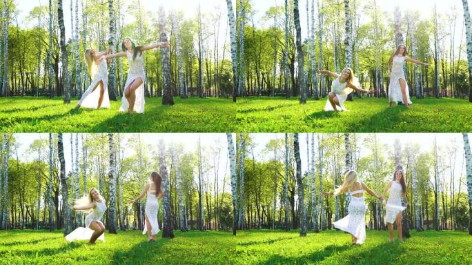 阳光照射在伯奇格罗夫的两个穿着性感连衣裙的女人赤脚跳舞