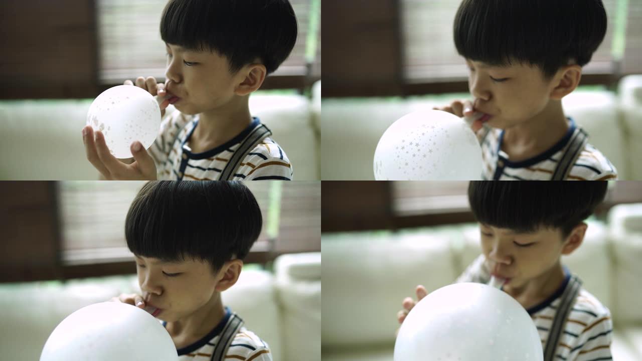 台湾男孩吹气球乐趣聚会气球