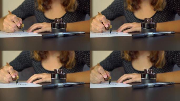 使用刻字技术在纸上写字的年轻女子书法的特写镜头
