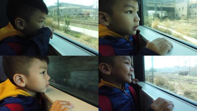 日本小子正从火车外望向外界