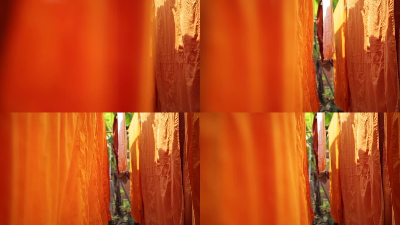 长袍的橙色背景，和尚的长袍为佛教思想概念。