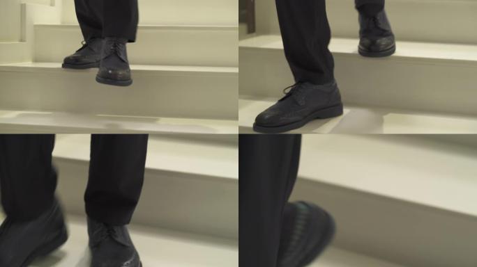 穿着华丽的黑色皮鞋下楼的男人的特写镜头。
