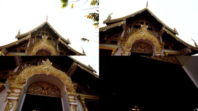 多莉相机在美丽的金色佛教寺庙上变焦。户外日拍摄