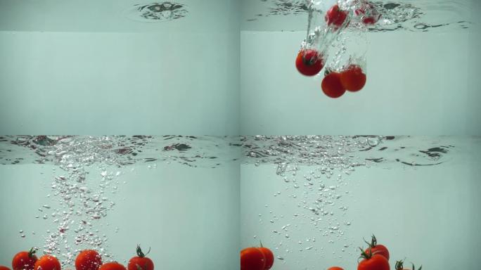 水中落下的西红柿。慢动作。