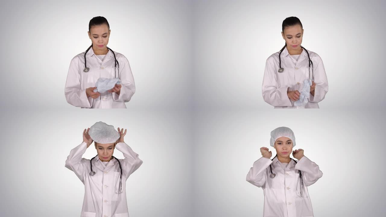 带听诊器的医生在渐变背景上戴上医用帽子或帽子