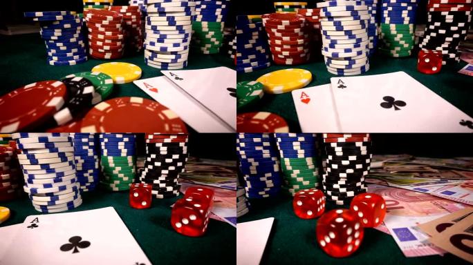 赌钱筹码扑克牌和红色骰子