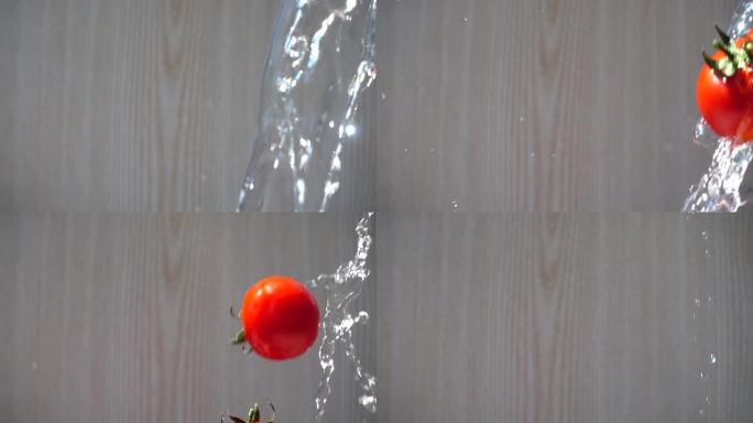 水柱落下的西红柿。慢动作。