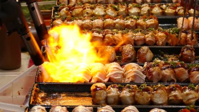 日本餐厅厨师烧烤鲑鱼寿司
