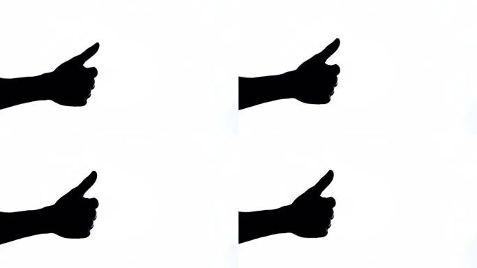 男性手的特写显示竖起大拇指的标志。认可意味着手势。肢体语言。黑白镜头