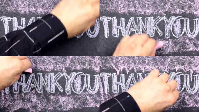 用粉笔写在黑板上的谢谢字。