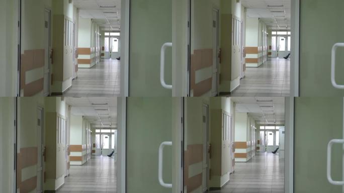 医院有绿色门的空走廊