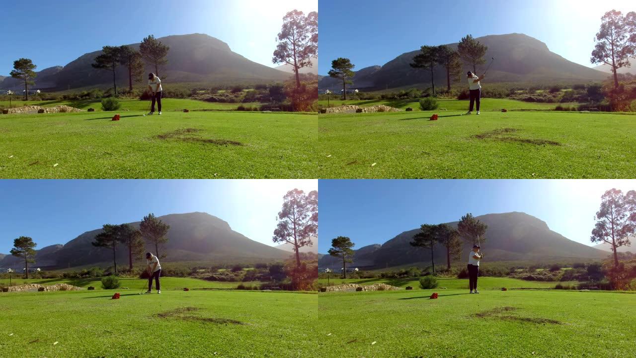 成熟的女人打高尔夫球