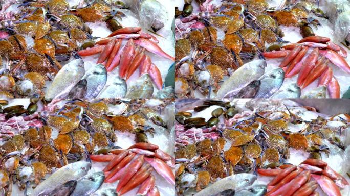 新鲜的海鱼，螃蟹，各种海鲜在街上商店的柜台上出售