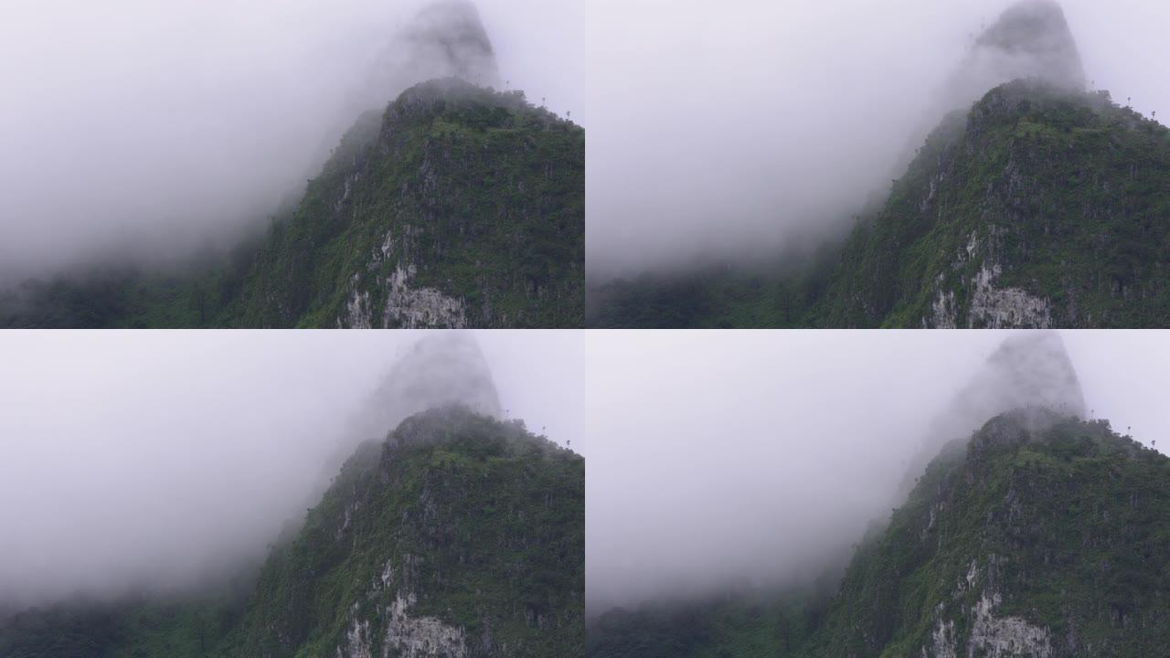 流动的雾覆盖了泰国北部清迈的多伊琅清道的大山脉