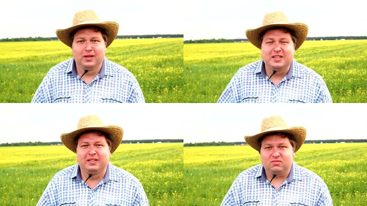 沮丧的农民站在田间哭泣，在阳光明媚的日子戴牛仔帽。沮丧，不适，悲伤的人