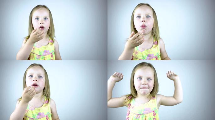 一个三岁的小女孩咳嗽，用手捂住嘴。在白色背景上