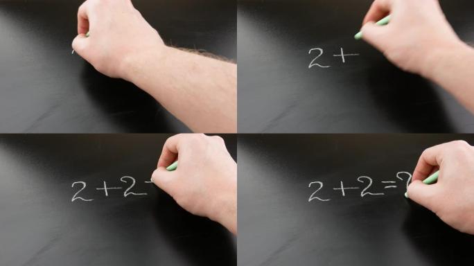 有人的手在黑板上粉笔，这是孩子们的数学例子。回到学校的概念。