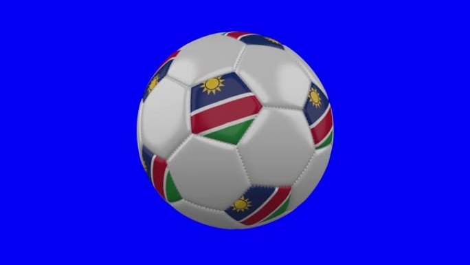 蓝色色度关键背景上带有纳米比亚国旗的足球，循环