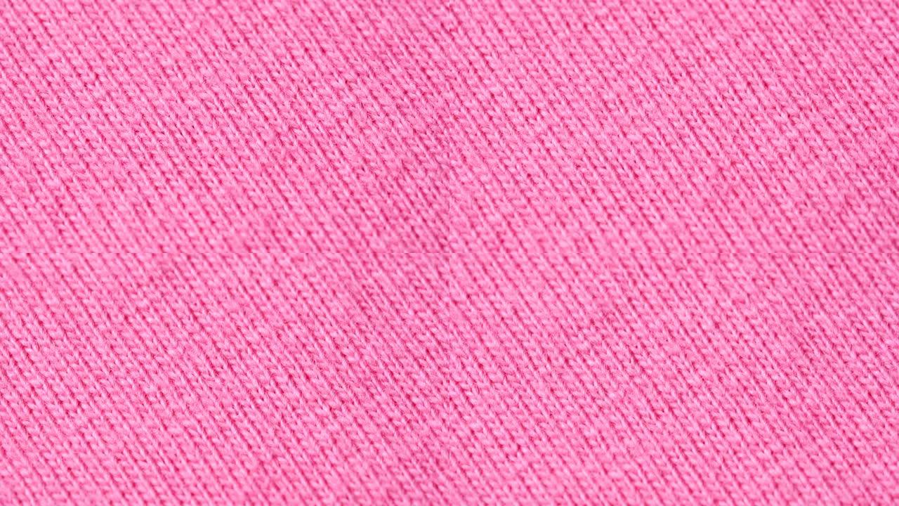 纺织背景-粉红色100% 棉布与球衣 (stockinette) 结构。
