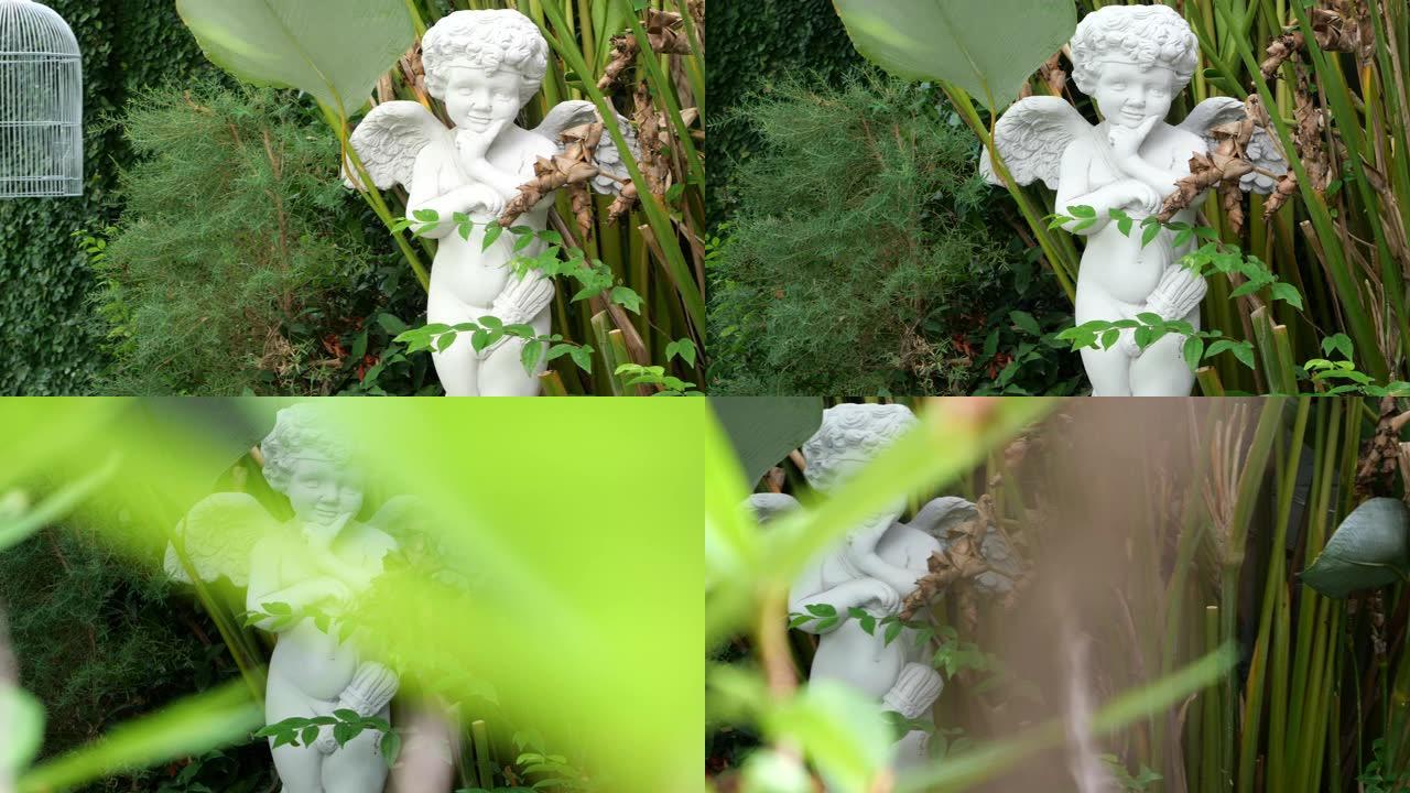 花园中丘比特雕塑的平移镜头
