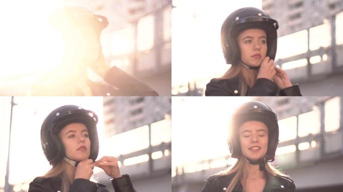 日落时，年轻摩托车手女子在户外戴上复古头盔的特写镜头。骑自行车的女孩穿着皮夹克穿旅行。前视图，慢动作