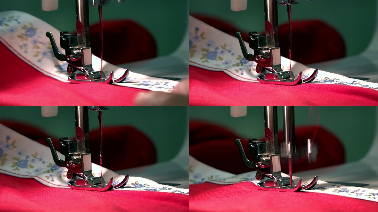 缝纫机针将弹性胶带刺入织物上，制成红色的接缝线