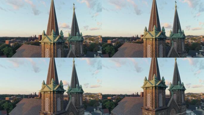 日落时宾夕法尼亚州伯利恒的全景风景。圣约瑟夫CR教堂。带有下降摄像机运动的空中无人机视频。