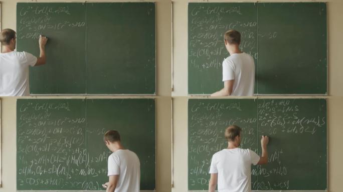 一个年轻的化学家的时间流逝在大学/学校的黑板上写了一个复杂的化学方程式。
